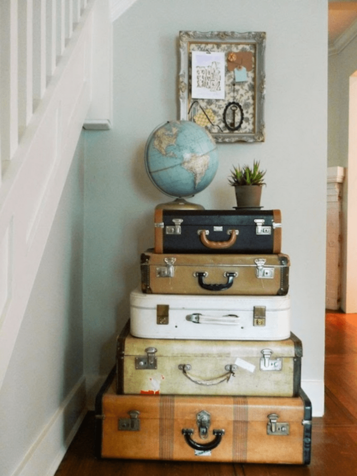 maletas apiladas: original recibidor